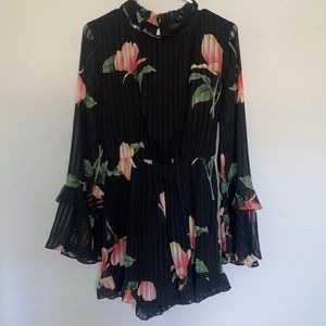 Black floral pleated romper